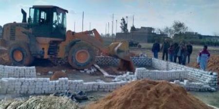 حملة لإزالة التعديات بأرمنت واسترداد 655 ألف متر مبانى
